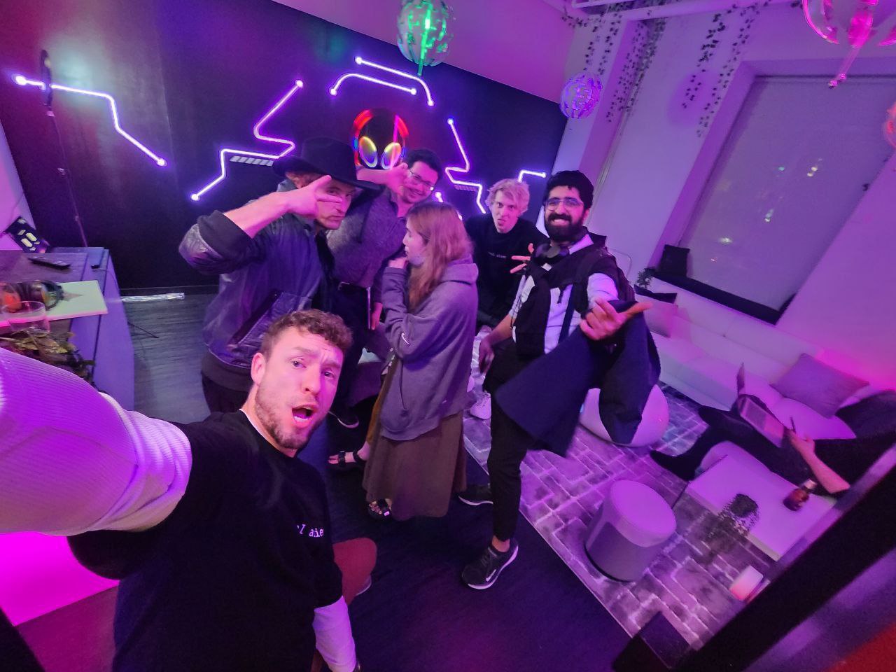 Neon party with LED wall art and purple lighting